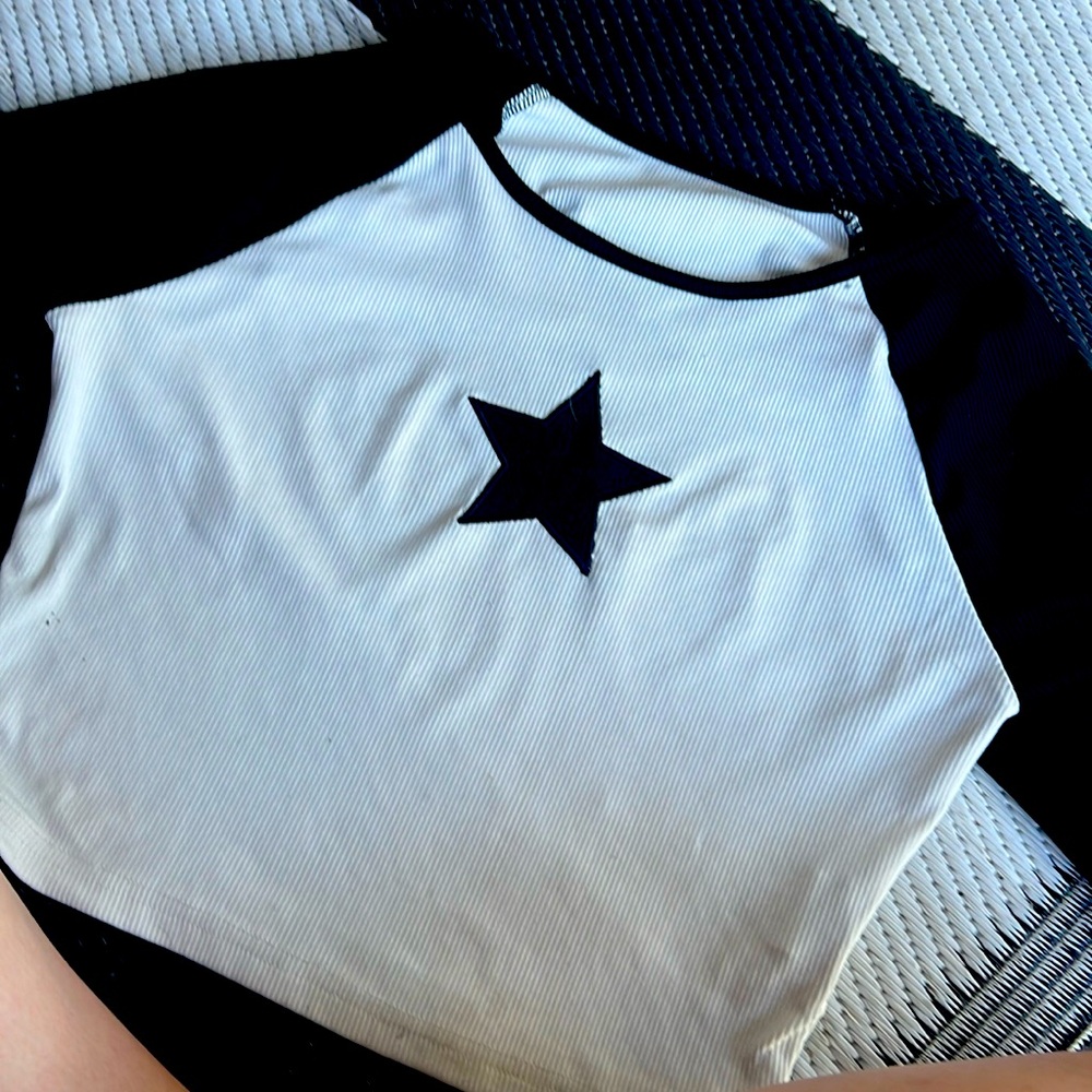 black and white tee size 12 in medium! perfect if your going for a grunge look!